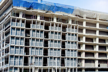 Unfinished cement building at a construction site