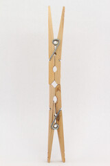 clothepins vertical formation white background