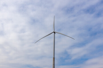 Fototapeta premium Wind Turbines Windmill Energy Farm. windmill wind turbines in field. Wind turbines power generator electric.