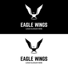 Eagle wing is spreading for flight company logo design mascot character and emblem