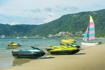 Water sport,  jet ski, boat, catamaran on the tropical beach. Concept active rest fun on the beach,...