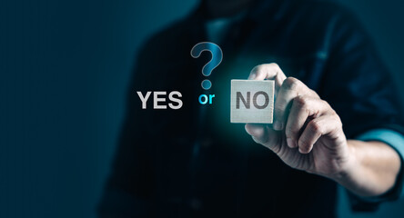 Businessman holding wooden block with YES or NO text for marketing decide solution