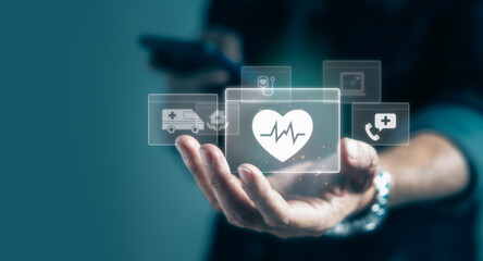 Businessman holding virtual medical health care icons in modern graphic interface