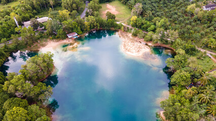 Naklejka na ściany i meble Aerial tropical landscape of Ta Teang swimming basin, Thai Mueang District, Phang-nga province, Thailand.