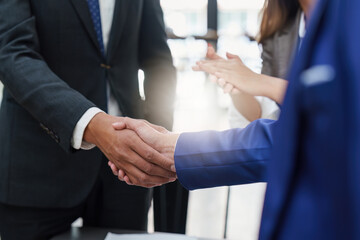 Business shaking hands. Successful businessmen handshaking after good deal. Finishing up meeting concept