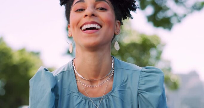Face, fun and gesture with a black woman pointing while standing outdoor and laughing or joking. Laugh, humor and joke with a female outside in the park gesturing I see you with a hand sign