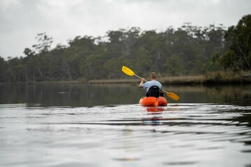 canoeing and kayaking on a river in Australia - obrazy, fototapety, plakaty
