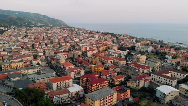 Drone footage of a small Italian town by the sea