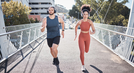 Fitness, couple and running with headphones for city exercise, workout or marathon training. Young...