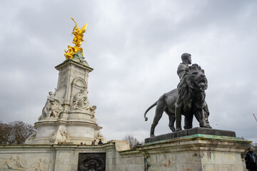 Fototapeta na wymiar Victoria Memorial near Buckingham Palace during winter cloudy day at London , United Kingdom : 13 March 2018