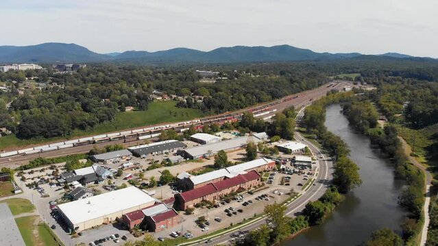 4K Aerial Drone Video Of French Broad River And Norfolk Southern Train Yard In Asheville, NC