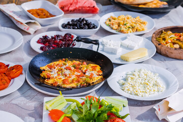 Hearty rich turkish breakfast on a table in restaurant