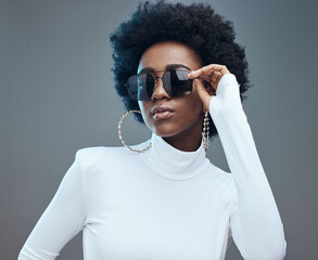 Sunglasses, fashion and young black woman with gen z style and designer with trendy brand against...
