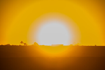 Sun set on magic lake surrounded by desert at Fayoum, sun set  shot