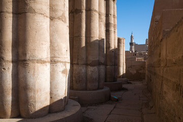 Egypt ancient architecture, close up of the Luxor temple column, view of The Abu Haggag Mosque...