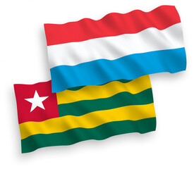 Obraz premium Flags of Togolese Republic and Luxembourg on a white background