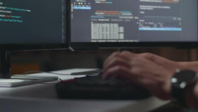 Close Up Of Male Programmer'S Hands Typing On Desktop Computer Creating Software Engineer Developing App, Program, Video Game At Home. Terminal With Coding Language 
