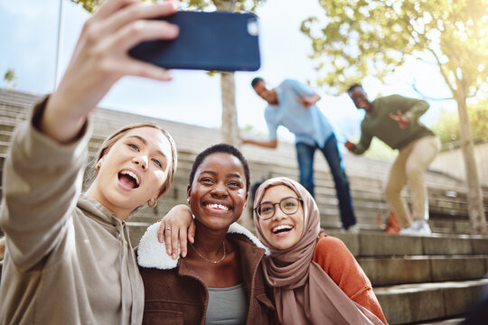 Diversity, happy women or phone selfie on college campus steps, university bleachers of school stairs for social media. Smile, bonding students or mobile photography technology for 5g profile picture