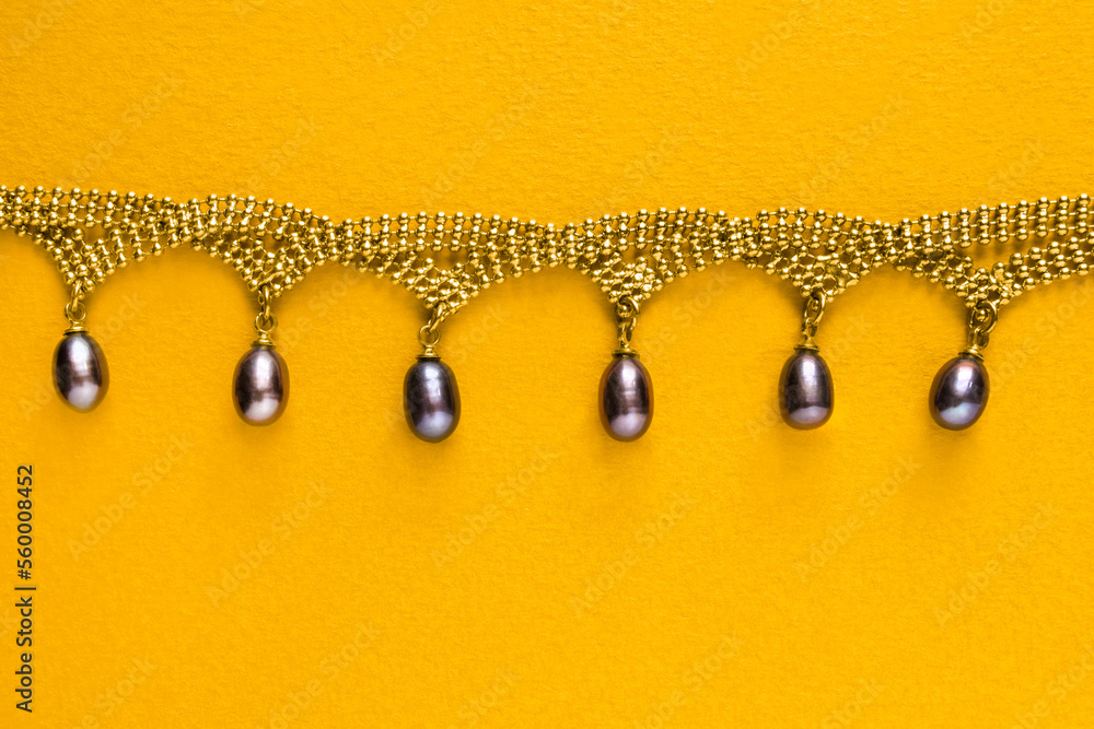 Sticker Necklace on yellow background