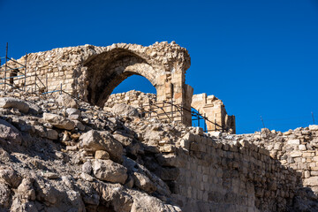 picturesque ancient ruins of ancient fortresses in Jordan against the blue sky