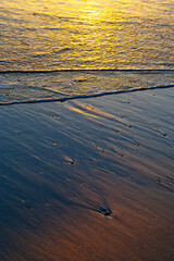 sunset at coast of the sea