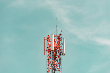 Telecommunication tower against the blue sky