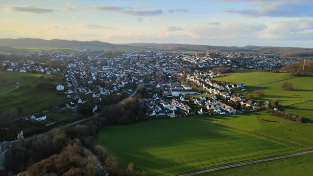 Winter Sunset in Warstein: Drone Footage of the Town Nestled in the Majestic Sauerland Mountains