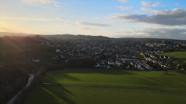 Winter Sunset in Warstein: Drone Footage of the Town Nestled in the Majestic Sauerland Mountains