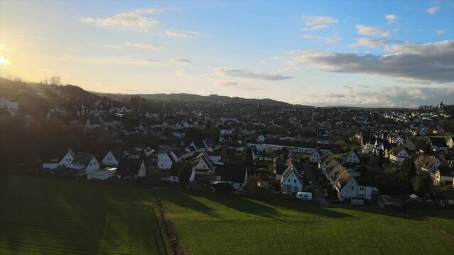 Winter Sunset in Warstein: Drone Footage of the Town Nestled in the Majestic Sauerland Mountains