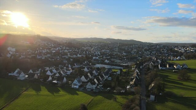 Winter Sunset in Warstein: Drone Footage of the Town Nestled in the Majestic Sauerland Mountains