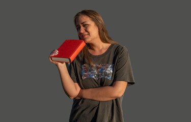 young beautiful woman with book, student studying in college