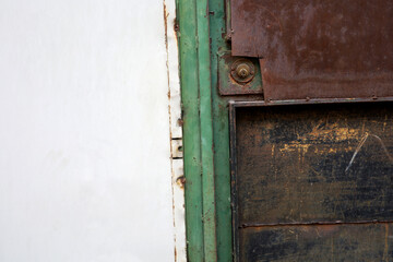 old rusty metal door of a house