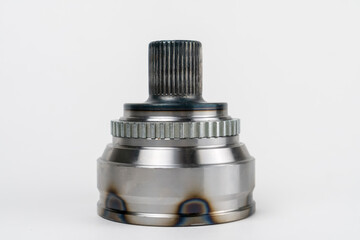 Close-up of a constant velocity joint on a white background. Universal spherical joint with constant speed new shiny. Concept of repair, car service, spare parts store