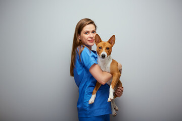 Veterinarian doctor with dog. Isolated portrait.