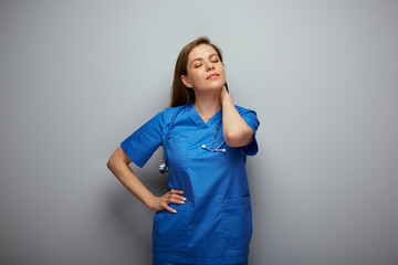 Tired doctor woman or nurse standing with hand on neck, closed eyes. Isolated portrait of female...