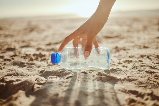 Woman, Hand Or Picking Plastic Bottle In Beach Waste Management, Community Service Or Climate Change Volunteering. Zoom, Collection Worker Or Trash Cleaning In Nature Sustainability Or Planet Recycle