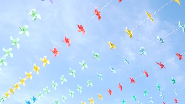 Decoration of the venue with small windmills of various colors during the New Year festival