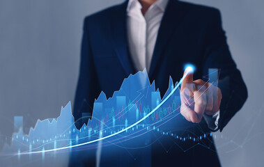 Businessman analysing economic growth graph financial data. Stock market investment. Financial and...