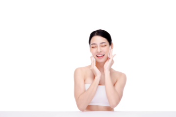 Attractive beauty young asian woman clean skin with cotton pad removing make up on white background.