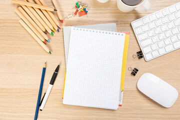 Notebook mockup with school stationery on a wooden table. back to school concept. Blank notepad with copy space. list of goals and plans for new year 2023