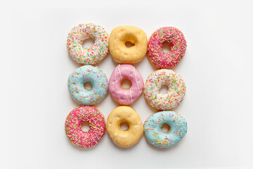 Colorful delicious donuts isolated on white background