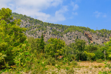 Fototapeta premium Turkish Taurus Mountains in the Kemer region of Antalya province. Background with copy space