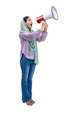 Asian Muslim woman in a headscarf yelling on a megaphone