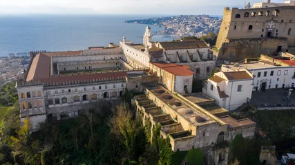 Sierkussen Aerial view of the Charterhouse of St. Martin, a former monastery complex, now a national museum, and Sant' Elmo castle. They are located on Vomero hill, that commands the city of Naples in Italy. © Stefano Tammaro