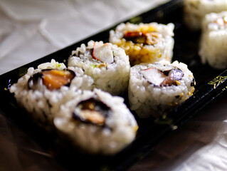 Sushi mixed on take away plate