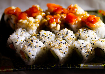 Sushi mixed on take away plate