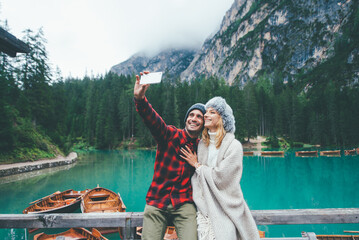 Mountain stories. Happy couple on a wanderlust vacation. Boyfriend and girlfriend spending time...