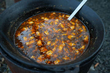 traditional Romanian food cooked in a cauldron. detail.