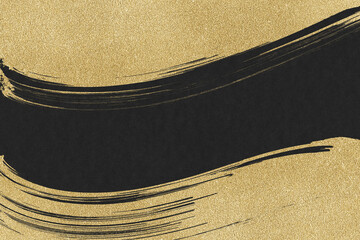 黒い紙に金色の絵具で描いた背景素材
