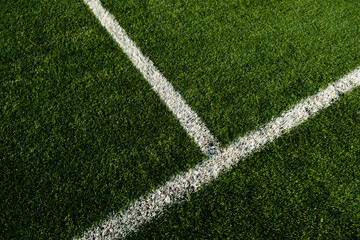 White lines at football pitch with artificial grass. - Powered by Adobe